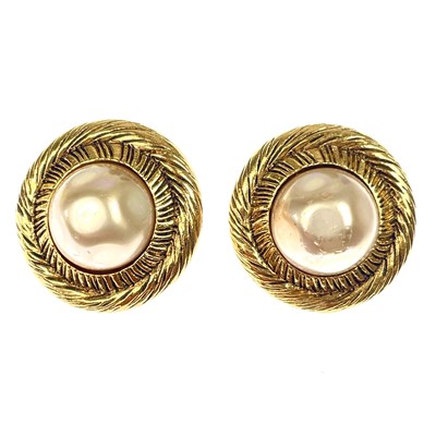 Lot 568 - A pair of Chanel gold-tone faux pearl clip earrings.