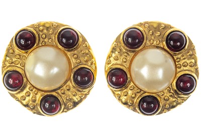 Lot 607 - A Chanel pair of large red gripoix and faux pearl gold-tone clip earrings.