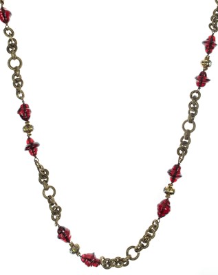 Lot 621 - A Chanel early Karl Lagerfeld design red Gripoix bead and crystal gold-tone necklace.