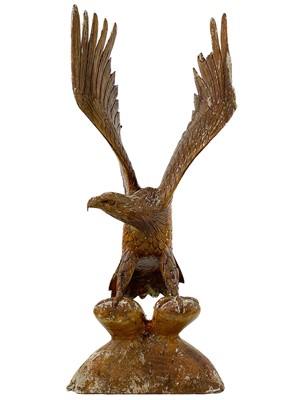 Lot 124 - A wood carved eagle sculpture.