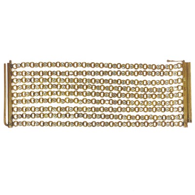 Lot 40 - A rare 1950's Chanel gilt metal crystal set chain link nine row bracelet.