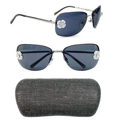 Lot 627 - A pair of Chanel sunglasses with silvered frames.