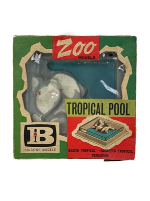 Lot 876 - Lead and plastic zoo and garden accessories and lead reference books.