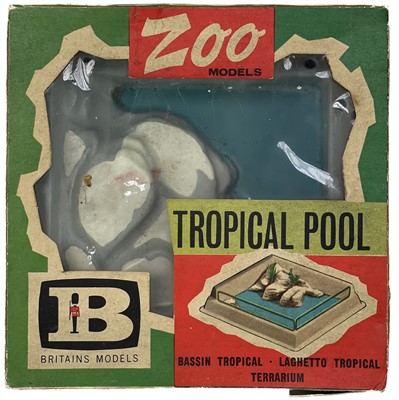 Lot 876 - Lead and plastic zoo and garden accessories and lead reference books.