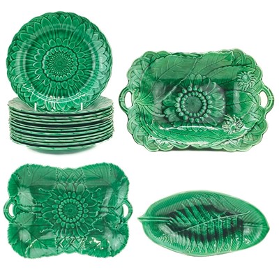 Lot 64 - A Wedgwood green earthenware sunflower part dessert service.