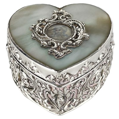 Lot 147 - A Victorian silver and mother-of-pearl heart-shaped trinket box.