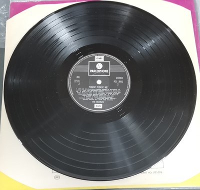 Lot 42 - The Beatles, four 12" albums related to the band.