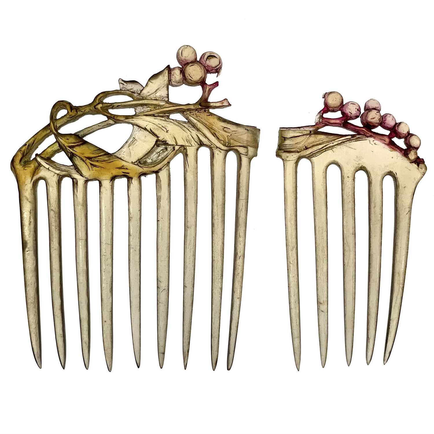 Lot 323 - Frederick James Partridge (1877-1942) An unfinished carved horn hair ornament.