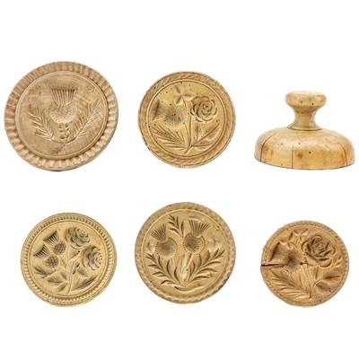 Lot 130 - Six treen butter stamps.