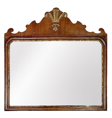 Lot 229 - A Queen Anne style walnut fretwork mirror.