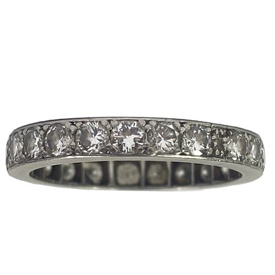 Lot 207 - An early 20th-century platinum diamond set full eternity ring.