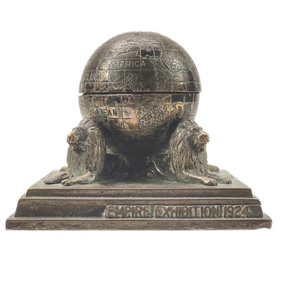 Lot 70 - A silvered cast metal 1924 Empire Exhibition globe trinket box.