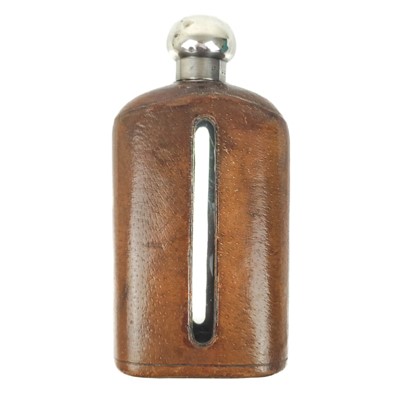 Lot 168 - A Victorian silver lidded, leather-covered glass hip flask retailed by Asprey.