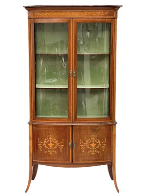 Lot 445 - An Edwardian mahogany, satinwood banded and inlaid display cabinet.