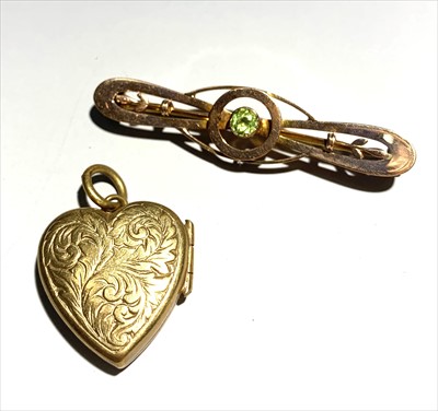 Lot 2448 - A 9ct gold brooch and locket