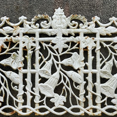 Lot 274 - A pair of mid 19th century cast iron garden benches.