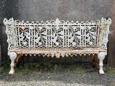 Lot 274 - A pair of mid 19th century cast iron garden benches.