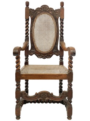 Lot 382 - A Victorian walnut caned armchair.