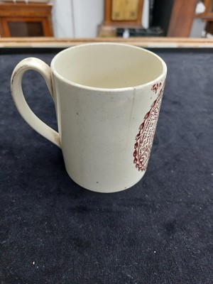 Lot 264 - A creamware sweetheart mug.