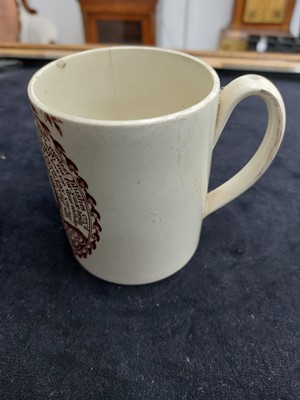 Lot 264 - A creamware sweetheart mug.