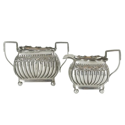 Lot 174 - A Victorian silver bachelor sized cream jug and sugar bowl by John Aldwinckle & Thomas Slater