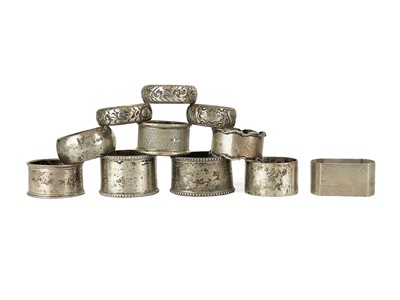 Lot 179 - A selection of eleven hallmarked silver napkin rings.