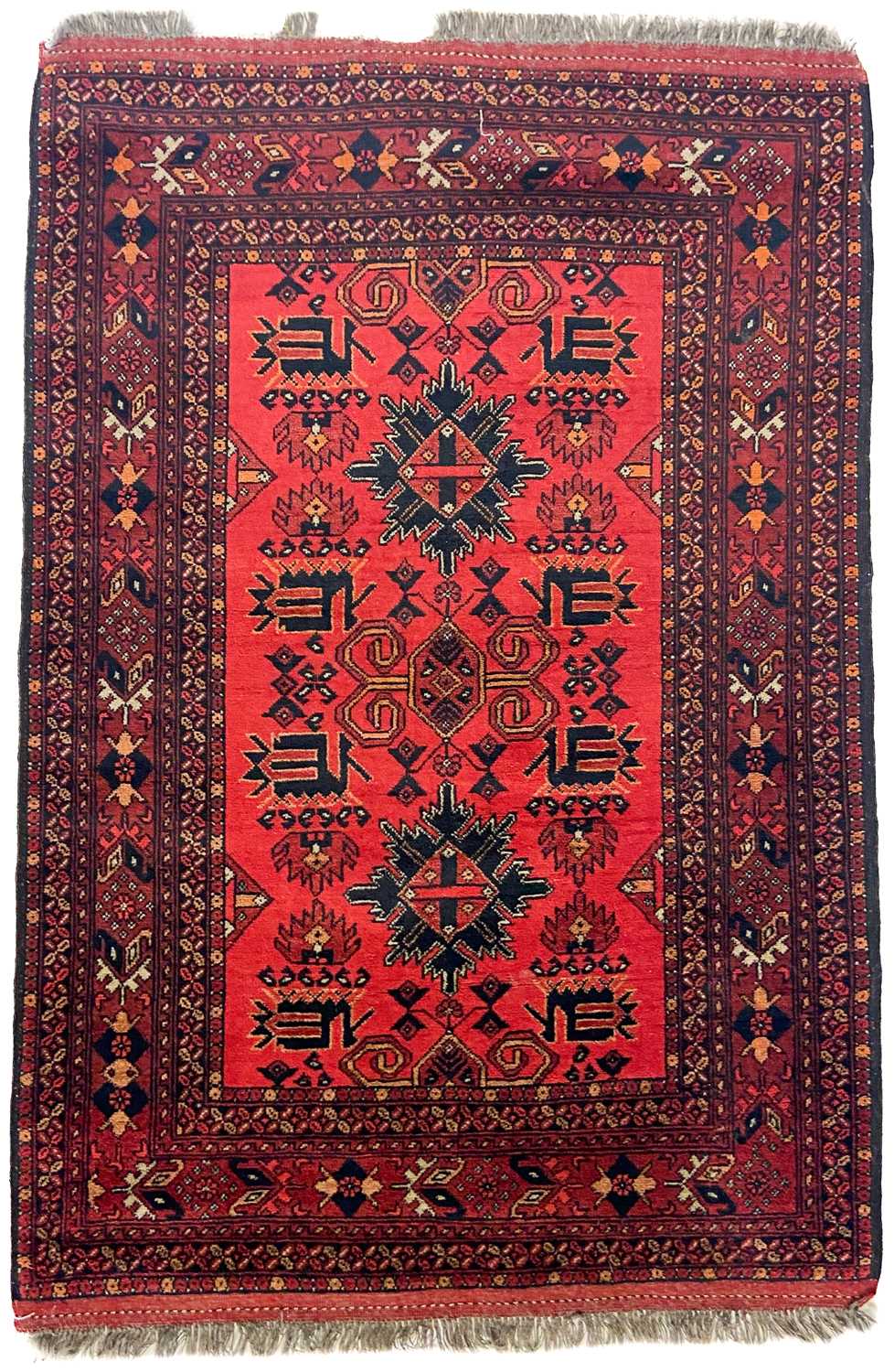 Lot 308 - An Afghan rug, mid 20th century.