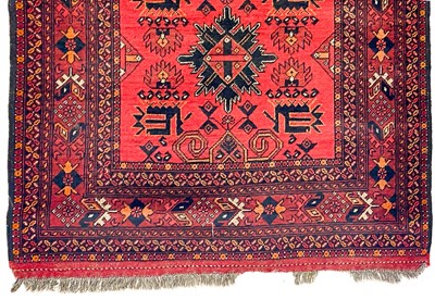 Lot 308 - An Afghan rug, mid 20th century.