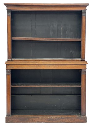 Lot 400 - A Regency rosewood open two part bookcase.