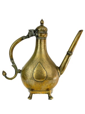 Lot 7 - A Mughal brass ewer, Deccan, Central India, 18th century