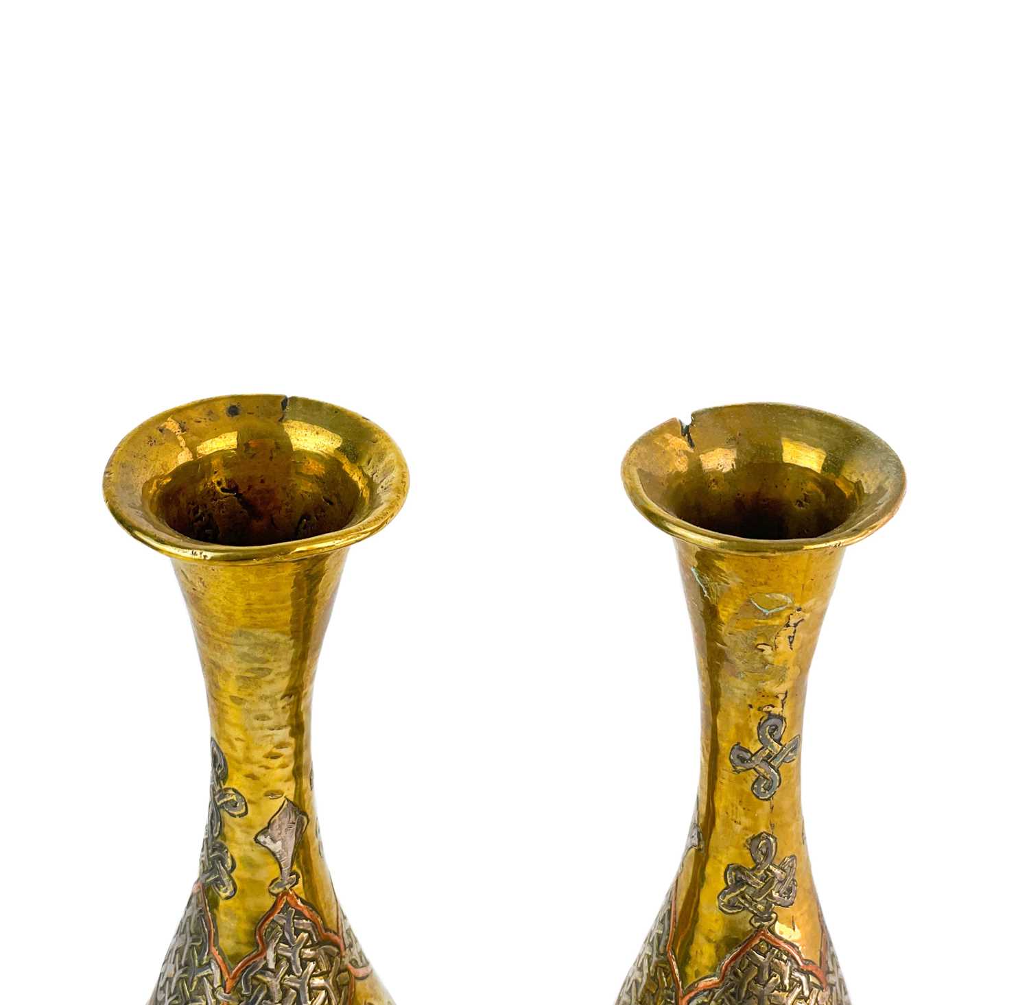 Lot 14 - A pair of Cairoware brass and silver inlaid