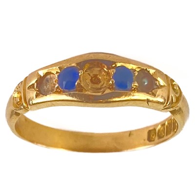 Lot 293 - A Victorian 18ct hallmarked gold sapphire and split seed pearl set ring.