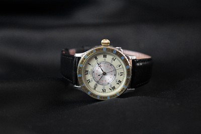 Lot 178 - Longines - A Longines Lindberg Hour Angle reissue bi-colour gentleman's automatic wristwatch.