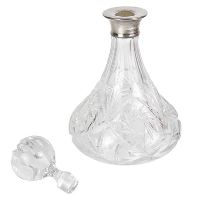 Lot 197 - A modern silver mounted cut glass ship's decanter by Mappin & Webb.
