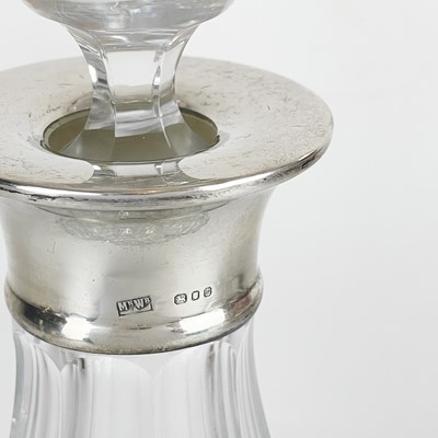 Lot 197 - A modern silver mounted cut glass ship's decanter by Mappin & Webb.