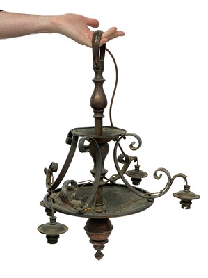 Lot 40 - An Arts and Crafts style copper electrolier.