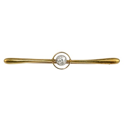 Lot 37 - A 15ct bar brooch target set with a single 0.20ct round cut diamond.