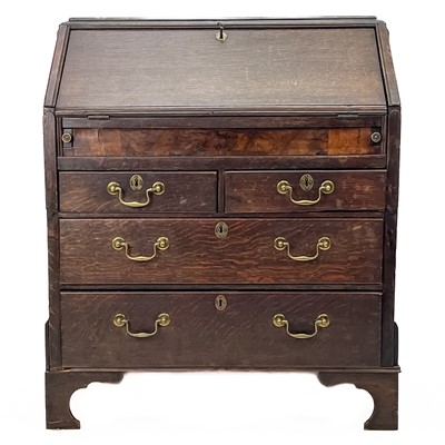 Lot 168 - A George II oak bureau.