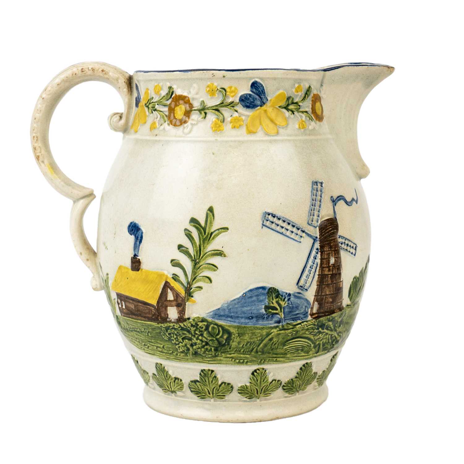 Lot 376 - A rare Prattware jug.