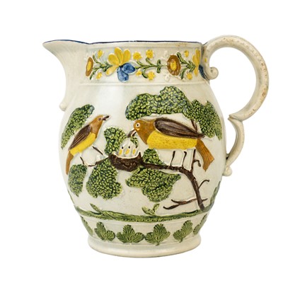 Lot 376 - A rare Prattware jug.