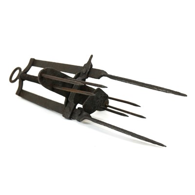 Lot 251 - A vintage wrought iron mole trap.