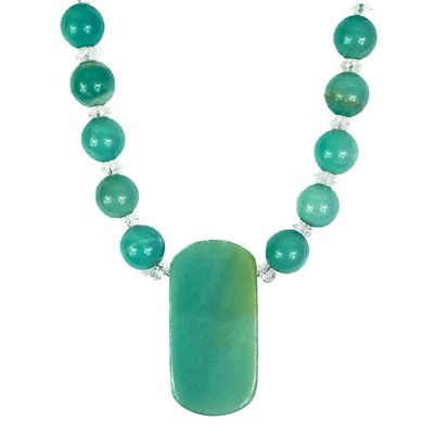 Lot 491 - A rock crystal and chrysoprase necklace with facet cut oblong pendant.