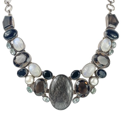 Lot 407 - A sterling silver semi precious gem set necklace.