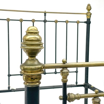 Lot 419 - A Victorian cast iron double bed frame.