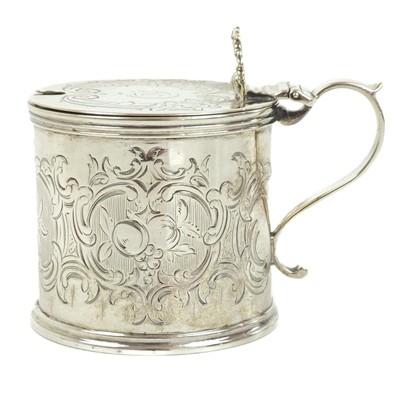 Lot 180 - A Victorian silver mustard pot with blue glass liner by Arthur Sibley.