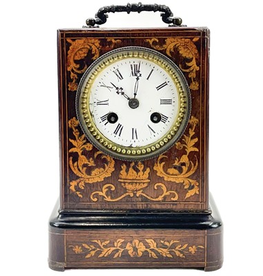 Lot 360 - A French rosewood and inlaid mantel clock.