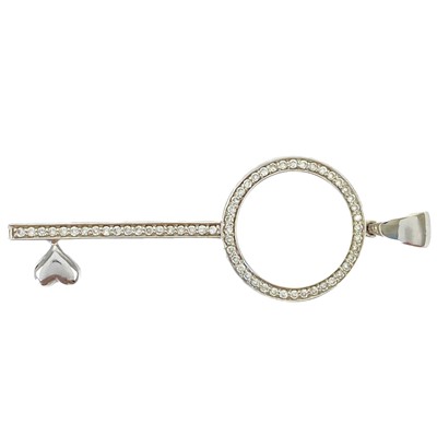 Lot 12 - A contemporary 14ct white gold diamond pave set key pendant by Amoro.