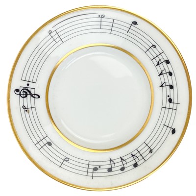 Lot 536 - A Tiffany & Co 1994 Henry Mancini 'Moon River' demitasse tea cup, saucer and plate set.