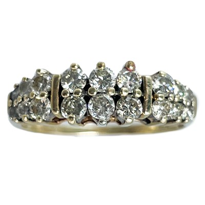 Lot 346 - A 10K diamond set two-row ring.