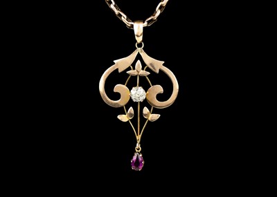 Lot 90 - An Art Nouveau 9ct gold yellow diamond set pendant necklace.